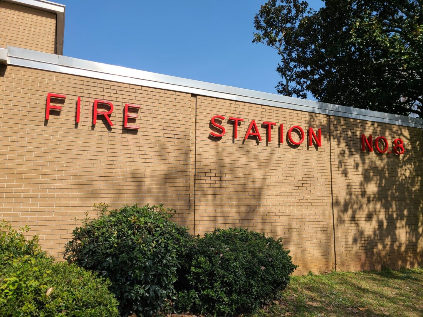 Fire Station Number Eight sign on a wall